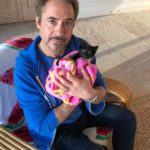 Robert Downey Jr with his cats Montgomery and D'Artagnan